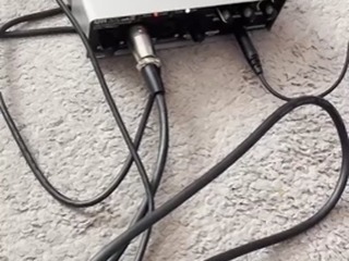 How do I connect a sound card with a microphone to my phone?
