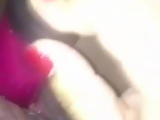 Girl playing with her toy and cumming