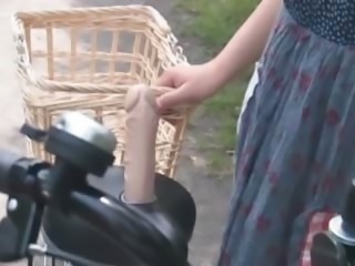 Asian teen sweeties getting twats all wet while riding the bike
