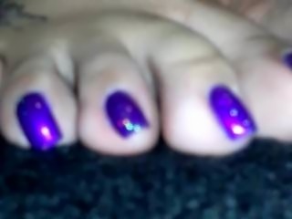 Purple long toenail