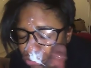 Awesome nerdy black nympho got messy facial cumshot after BJ