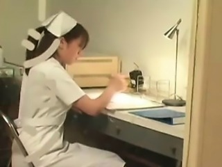 Lovely Asian nurse loses her clothes and exposes her marvel