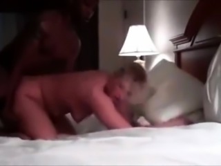 Horny blonde wife gets fucked from behind by her black lover